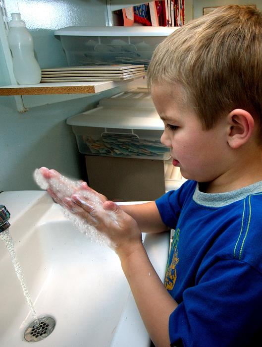 boy washing hands