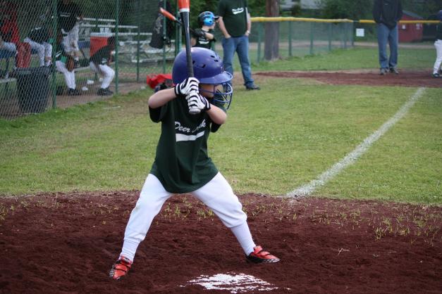 Kid playing baseball